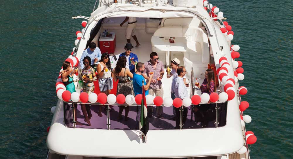 Guests celebrating on a private party ferry in Mumbai harbour