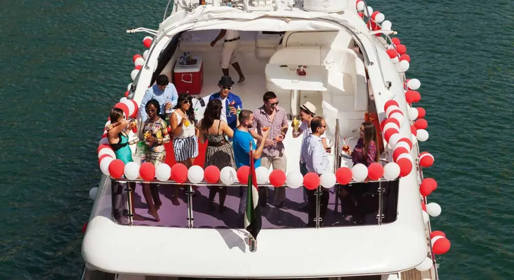 Ferry Party Booking, Kasimi Motor Launch Services Guests celebrating on a private party ferry in Mumbai harbour