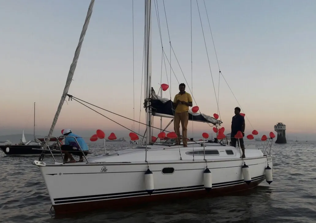 Open-deck sailing boat on Mumbai harbour, Kasimi Motor Launch Services